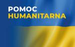 Napis pomoc humanitarna na tle flagi Ukrainy