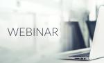 Z prawej strony otwarty laptop, z lewej napis Webinar